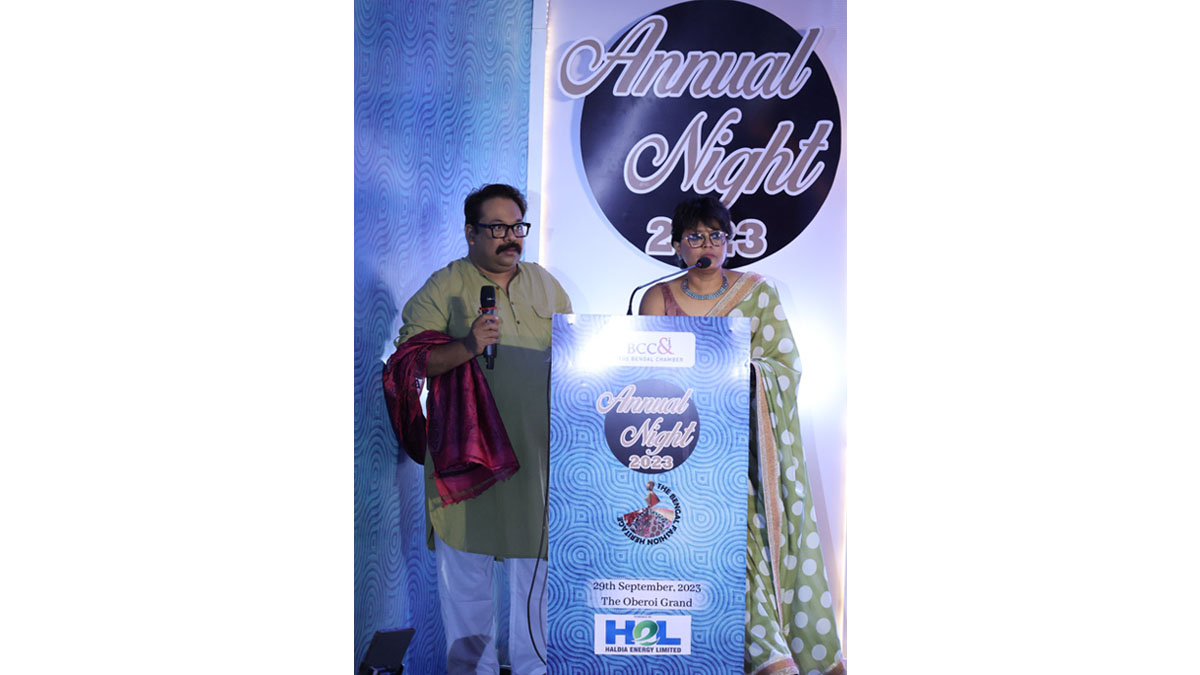 Mr. Arnab Chakraborty, Director, BCC&I, and Ms. Soma Mitra Mukherjee, Director, BCC&I on the left and Mr. Kumar Shivam, Director, BCC&I on the right, from The Chamber Secretariat, emceeing at the Defile de mode – a specially curated Runway walk on the occasion of BCC&I’s Annual Night 2023.