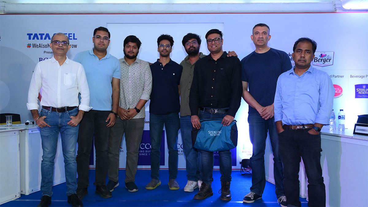 Quiz Masters and the top three teams after the quiz.